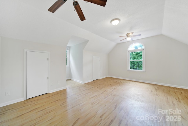 10807 Summitt Tree Ct, Charlotte, NC 28277 - bonus room with a ceiling fan, light wood finished floors, and vaulted ceiling