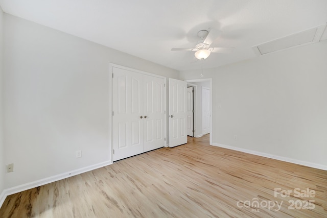 10807 Summitt Tree Ct, Charlotte, NC 28277 - unfurnished bedroom featuring wood finished floors, a closet, and a ceiling fan