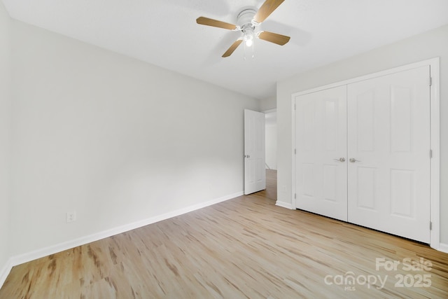 10807 Summitt Tree Ct, Charlotte, NC 28277 - unfurnished bedroom with wood finished floors, a closet, and ceiling fan