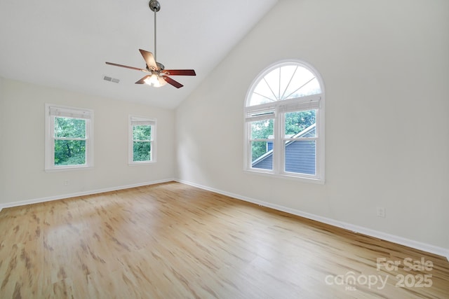 10807 Summitt Tree Ct, Charlotte, NC 28277 - spare room with wood finished floors, ceiling fan, and high vaulted ceiling