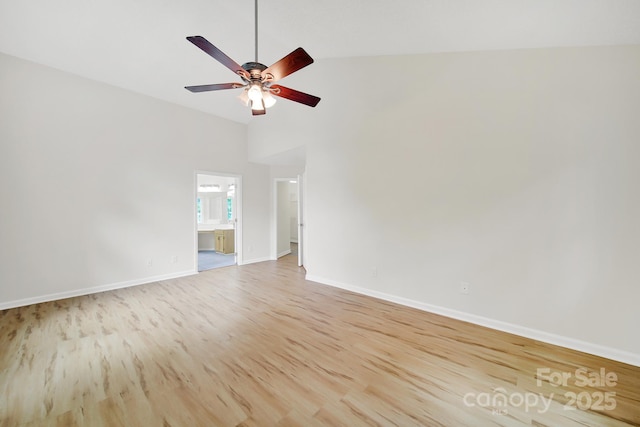10807 Summitt Tree Ct, Charlotte, NC 28277 - spare room with light wood finished floors, vaulted ceiling, and ceiling fan