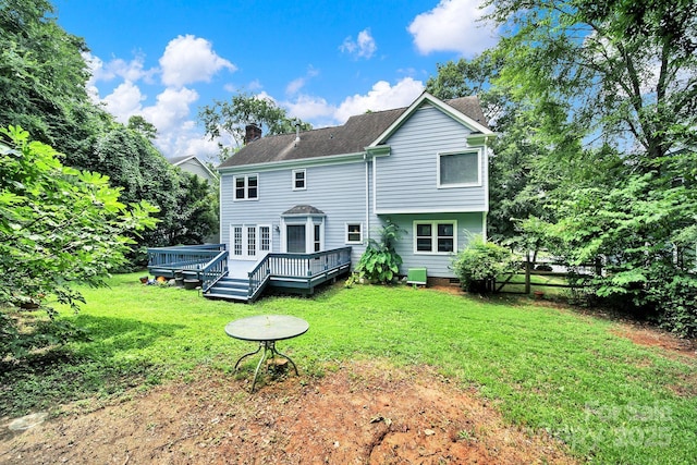 10807 Summitt Tree Ct, Charlotte, NC 28277 - back of property with a chimney, a wooden deck, and roof with shingles