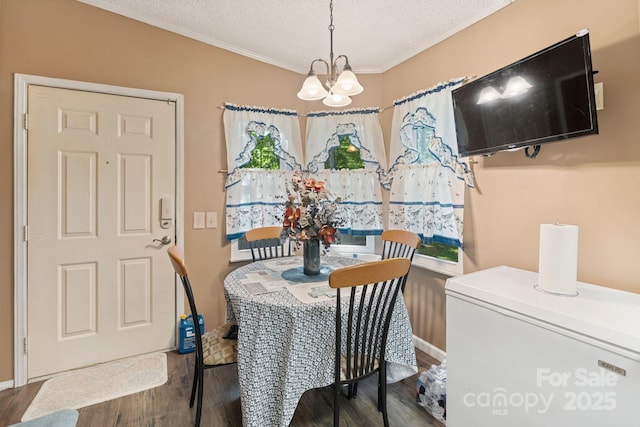 115 Red Fox Ct, Mount Holly, NC 28120 - dining room with crown molding, a chandelier, wood finished floors, and a textured ceiling