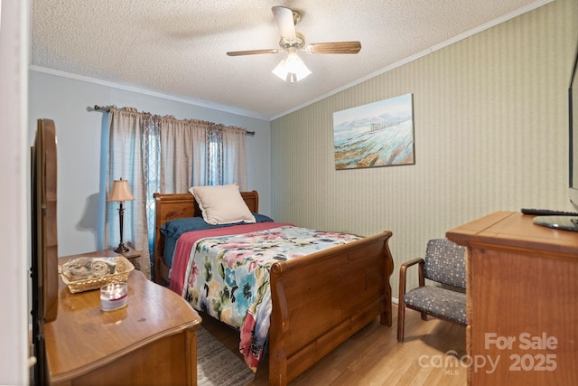 115 Red Fox Ct, Mount Holly, NC 28120 - bedroom featuring wood finished floors, ornamental molding, a textured ceiling, and ceiling fan