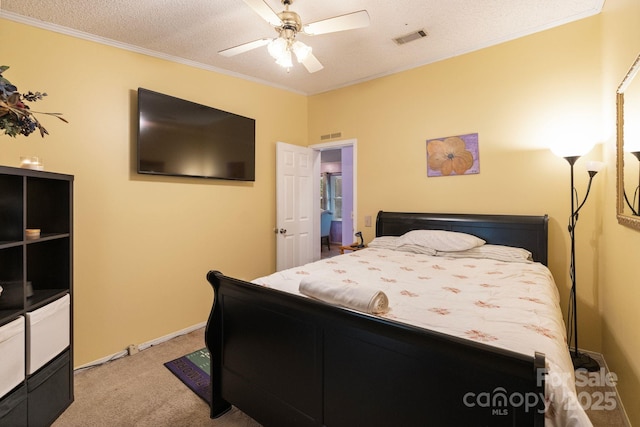 115 Red Fox Ct, Mount Holly, NC 28120 - bedroom with light carpet, ornamental molding, a textured ceiling, and a ceiling fan
