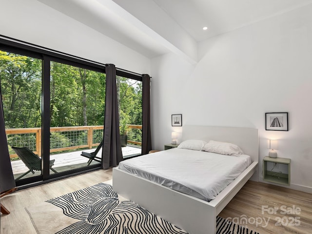 1761 Williamson Creek Rd, Pisgah Forest, NC 28768 - bedroom featuring wood finished floors, access to exterior, and recessed lighting
