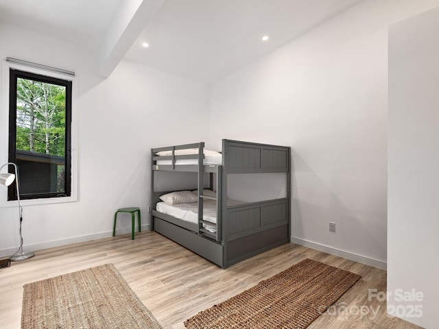 1761 Williamson Creek Rd, Pisgah Forest, NC 28768 - unfurnished bedroom with wood finished floors and recessed lighting