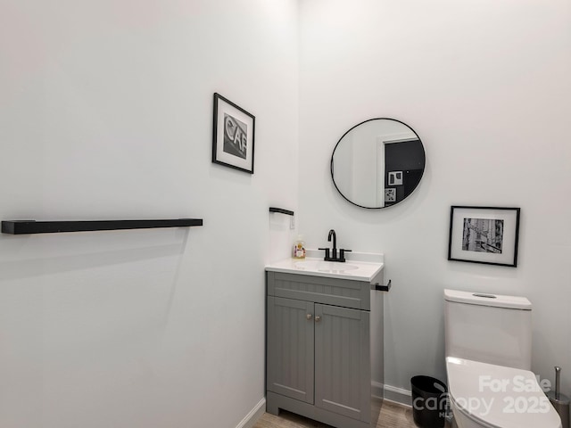 1761 Williamson Creek Rd, Pisgah Forest, NC 28768 - bathroom featuring vanity and wood finished floors