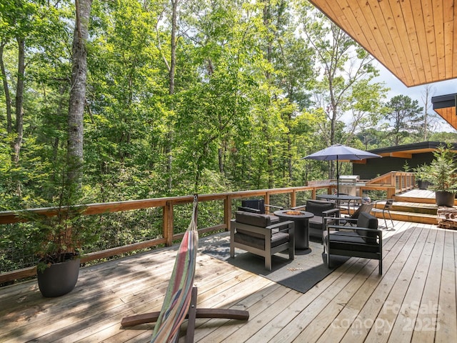 1761 Williamson Creek Rd, Pisgah Forest, NC 28768 - wooden terrace featuring an outdoor living space with a fire pit