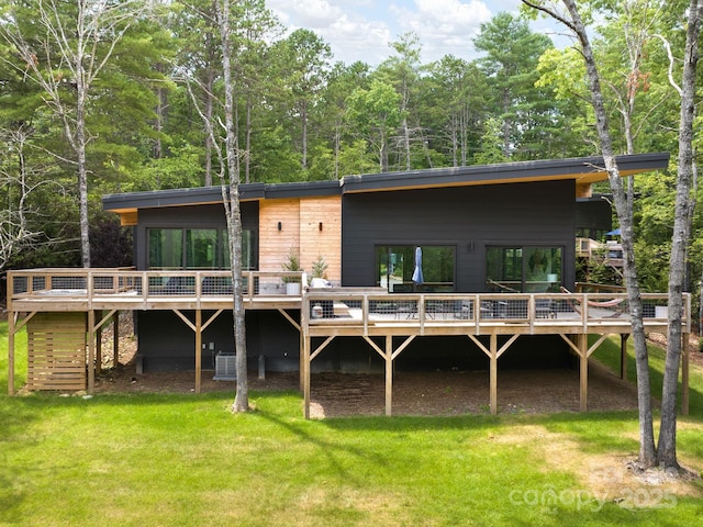 1761 Williamson Creek Rd, Pisgah Forest, NC 28768 - rear view of house featuring a wooden deck, a yard, and stairs