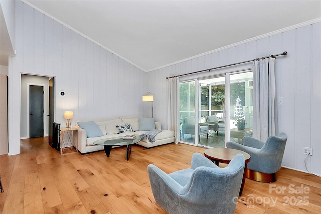 4906 Crooked Oak Ln, Charlotte, NC 28226 - living area featuring ornamental molding, wood finished floors, and vaulted ceiling