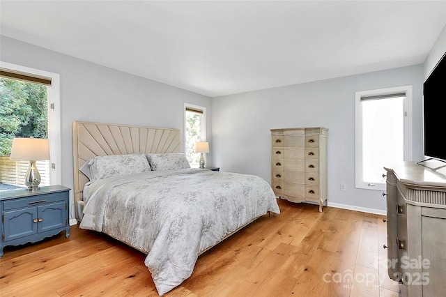 4906 Crooked Oak Ln, Charlotte, NC 28226 - bedroom with light wood-style flooring and baseboards