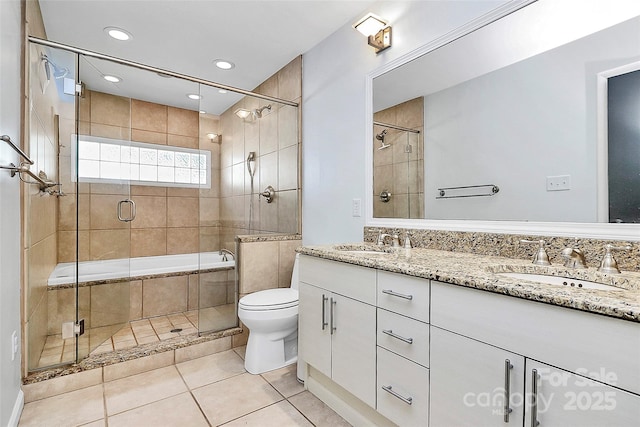 4906 Crooked Oak Ln, Charlotte, NC 28226 - full bath featuring tile patterned flooring, double vanity, a stall shower, and recessed lighting