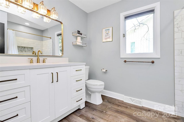 4906 Crooked Oak Ln, Charlotte, NC 28226 - bathroom with wood finished floors, vanity, and a tile shower