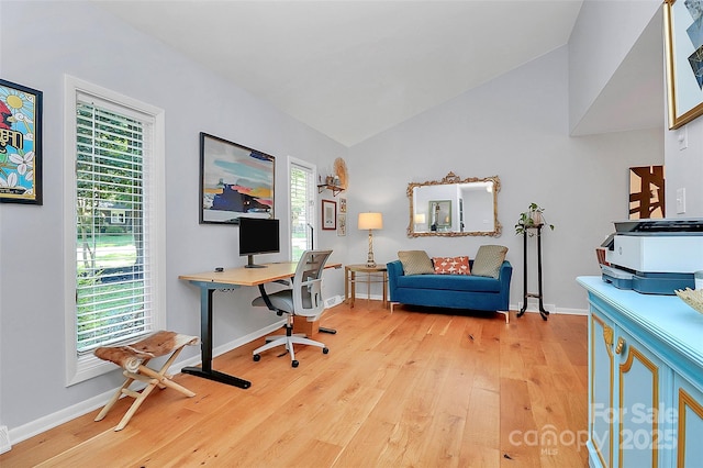 4906 Crooked Oak Ln, Charlotte, NC 28226 - office featuring light wood finished floors, vaulted ceiling, and plenty of natural light