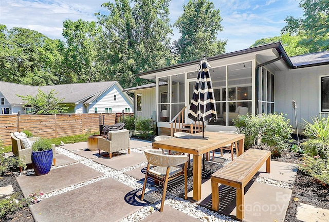 4906 Crooked Oak Ln, Charlotte, NC 28226 - view of patio / terrace featuring a sunroom and outdoor dining space