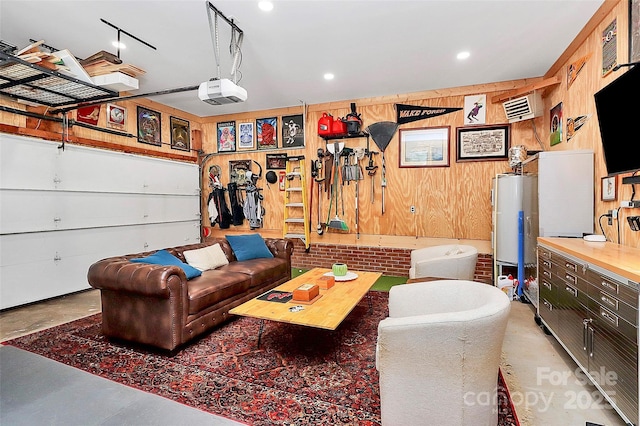 4906 Crooked Oak Ln, Charlotte, NC 28226 - living room featuring concrete floors, gas water heater, and a garage
