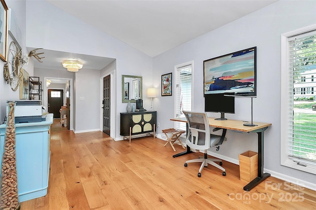 4906 Crooked Oak Ln, Charlotte, NC 28226 - home office featuring lofted ceiling, light wood-style flooring, and healthy amount of natural light