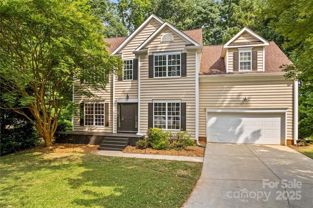 145 Summerbrook Ln, Mooresville, NC 28117 - traditional-style house with driveway, a front yard, a shingled roof, and an attached garage