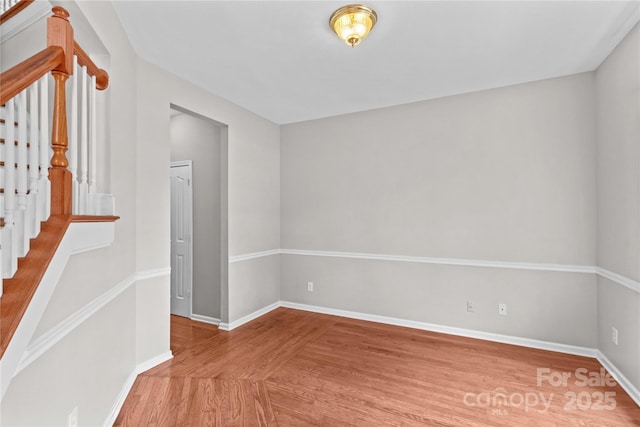 145 Summerbrook Ln, Mooresville, NC 28117 - empty room with wood finished floors and stairs