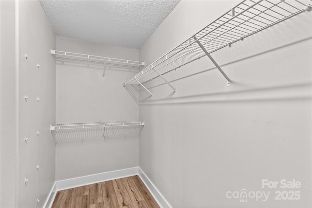145 Summerbrook Ln, Mooresville, NC 28117 - spacious closet with wood finished floors