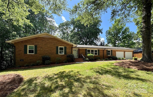 635 Windsor Pl NE, Concord, NC 28025 - ranch-style home featuring brick siding, a front yard, and a garage