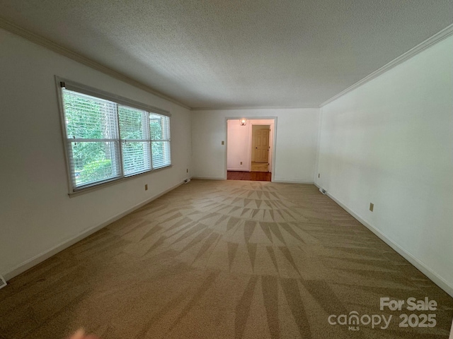 635 Windsor Pl NE, Concord, NC 28025 - empty room featuring crown molding, carpet floors, and a textured ceiling