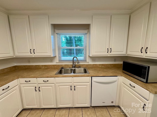 635 Windsor Pl NE, Concord, NC 28025 - kitchen featuring white dishwasher, stainless steel microwave, white cabinetry, and light tile patterned floors