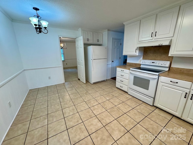 635 Windsor Pl NE, Concord, NC 28025 - kitchen featuring white appliances, under cabinet range hood, white cabinetry, a chandelier, and light tile patterned floors