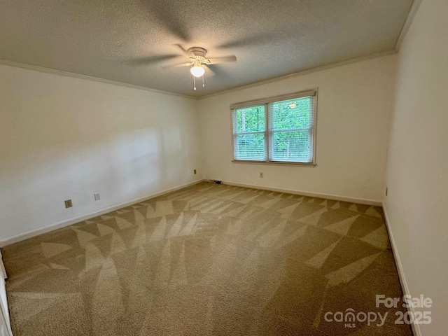 635 Windsor Pl NE, Concord, NC 28025 - spare room with light colored carpet, a textured ceiling, a ceiling fan, and ornamental molding