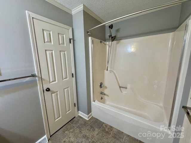 635 Windsor Pl NE, Concord, NC 28025 - full bathroom with bathing tub / shower combination, a textured ceiling, and crown molding