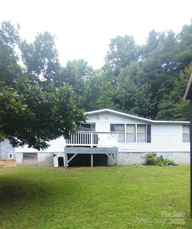 101 Branch Breeze Ln, Zirconia, NC 28790 - view of front facade featuring a deck and a front yard