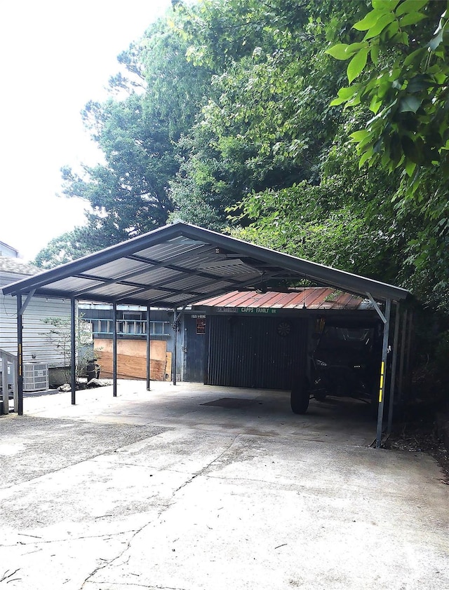 101 Branch Breeze Ln, Zirconia, NC 28790 - view of vehicle parking featuring a carport and driveway