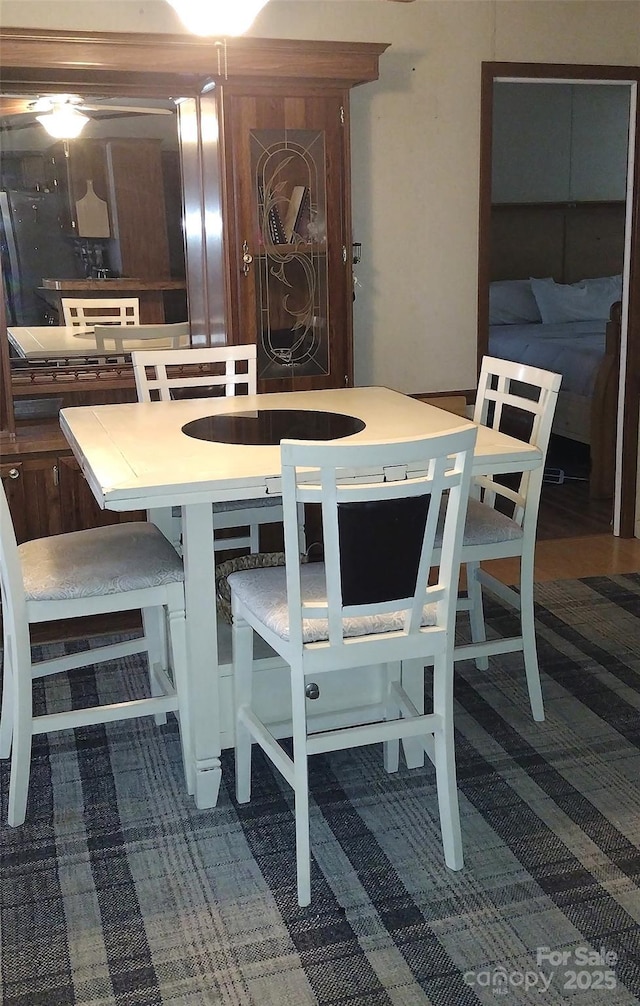 101 Branch Breeze Ln, Zirconia, NC 28790 - dining area featuring dark colored carpet
