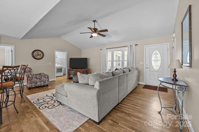 1974 Redwood Dr, Oakboro, NC 28129 - living room with vaulted ceiling, a ceiling fan, and wood finished floors