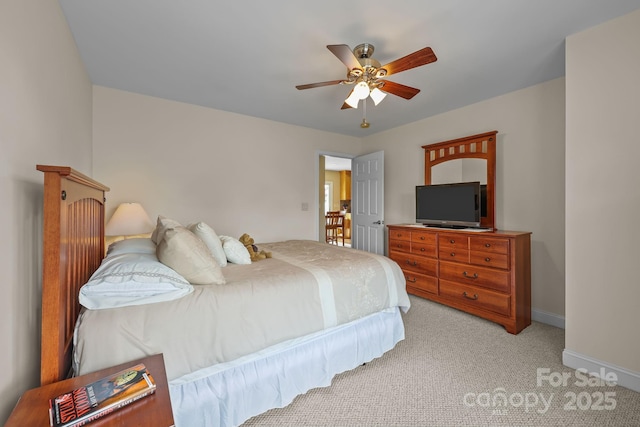 1974 Redwood Dr, Oakboro, NC 28129 - bedroom featuring light carpet and a ceiling fan
