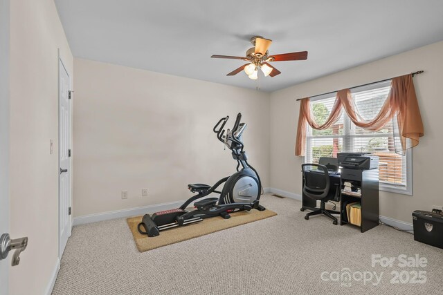 1974 Redwood Dr, Oakboro, NC 28129 - workout area featuring ceiling fan and carpet flooring