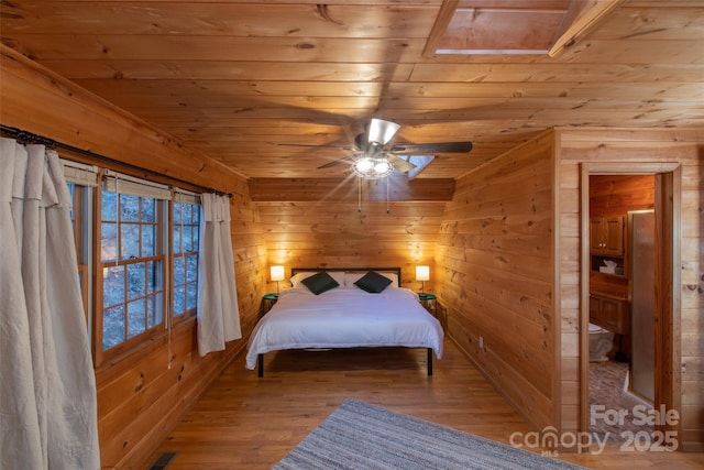 2311 Old Mountain Rd, Mars Hill, NC 28754 - bedroom with wood ceiling, wood finished floors, and wood walls