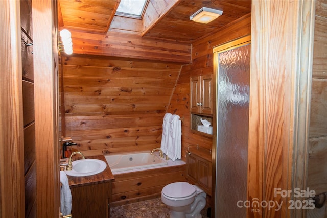 2311 Old Mountain Rd, Mars Hill, NC 28754 - bathroom featuring a skylight, a tub to relax in, wood ceiling, wooden walls, and vanity