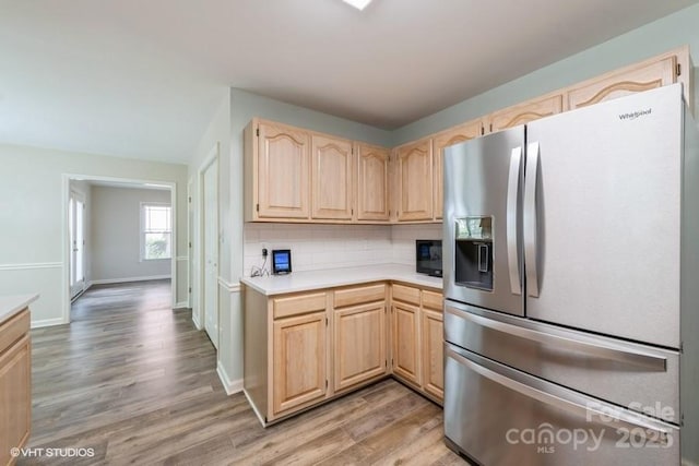 608 Laurel Fork Dr, Matthews, NC 28105 - kitchen with stainless steel fridge, light brown cabinetry, and light countertops