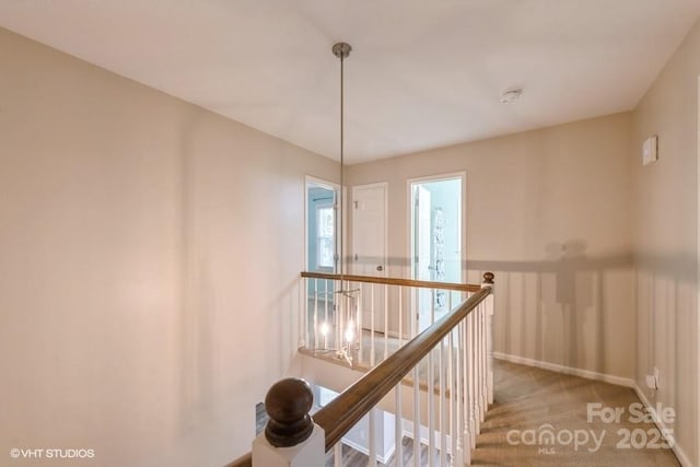 608 Laurel Fork Dr, Matthews, NC 28105 - hall featuring an upstairs landing and carpet flooring