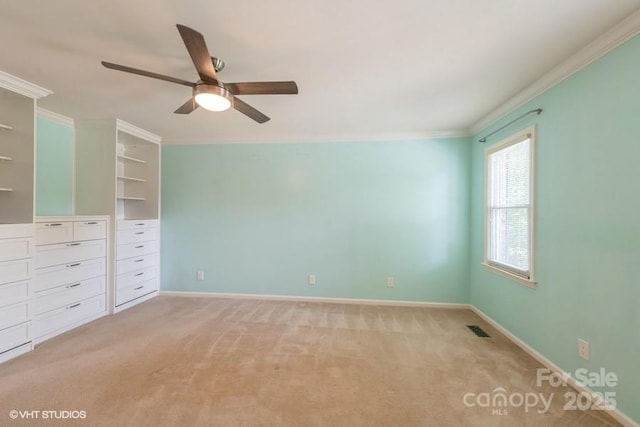 608 Laurel Fork Dr, Matthews, NC 28105 - unfurnished bedroom featuring crown molding, light carpet, and a ceiling fan