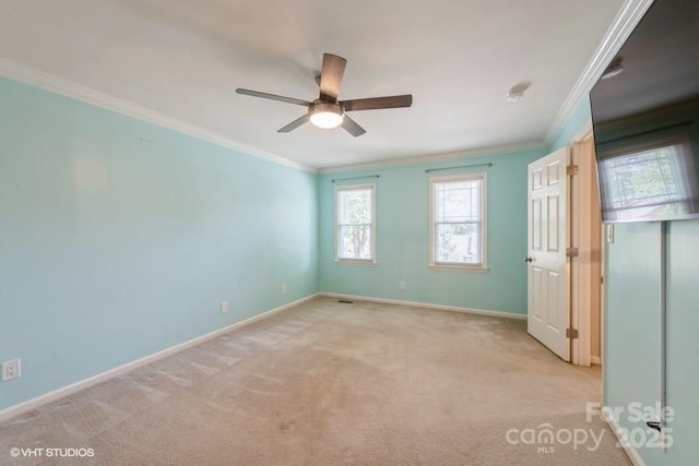 608 Laurel Fork Dr, Matthews, NC 28105 - unfurnished bedroom with carpet, ornamental molding, and a ceiling fan