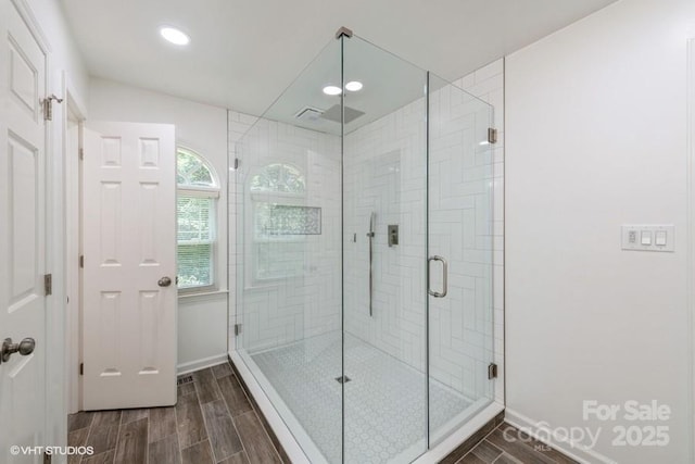 608 Laurel Fork Dr, Matthews, NC 28105 - full bath with wood tiled floors, a stall shower, and recessed lighting