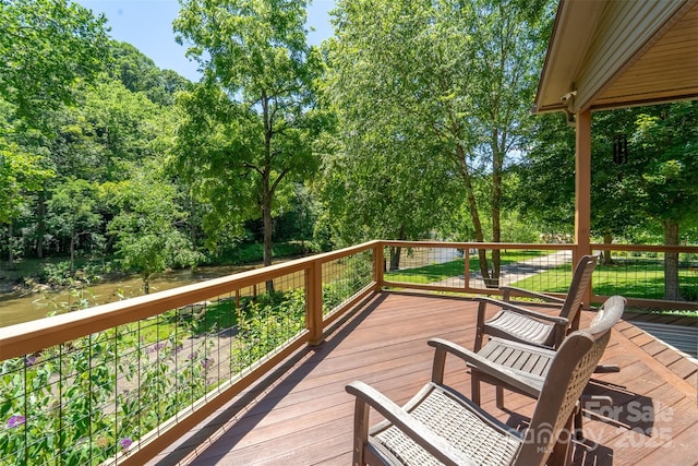 846 Duckback Trl, Whittier, NC 28789 - deck featuring a water view and view of scattered trees