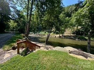 846 Duckback Trl, Whittier, NC 28789 - surrounding community with a lawn
