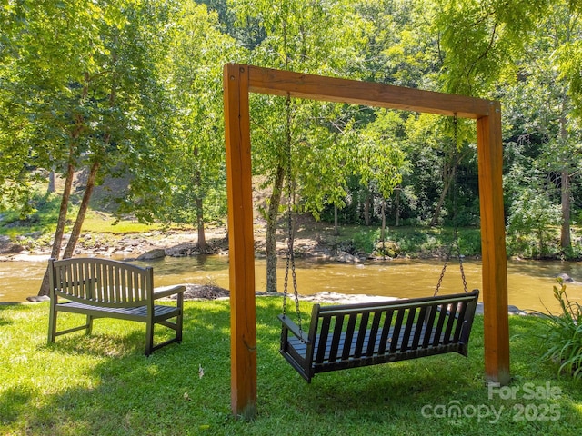 846 Duckback Trl, Whittier, NC 28789 - surrounding community with a lawn and a water view