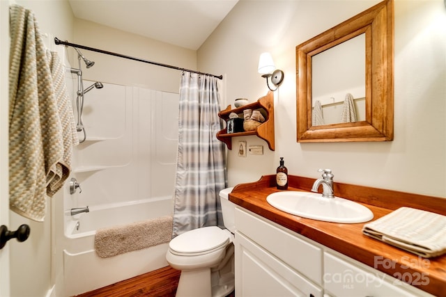 846 Duckback Trl, Whittier, NC 28789 - bathroom featuring shower / bath combination with curtain, vanity, and wood finished floors
