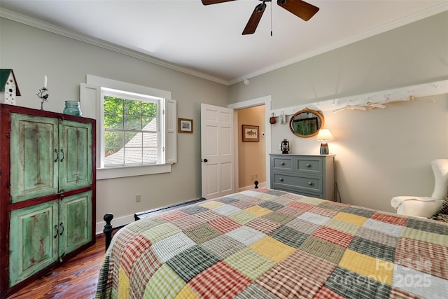 846 Duckback Trl, Whittier, NC 28789 - bedroom with crown molding, dark wood-style flooring, a baseboard heating unit, and ceiling fan