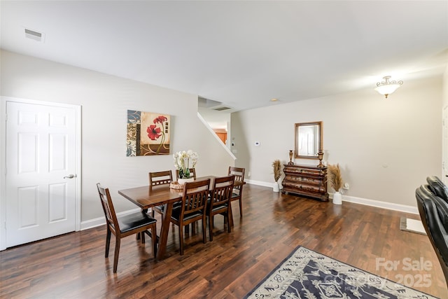 2015 Savannah Hills Dr, Matthews, NC 28105 - dining space featuring wood finished floors and stairway